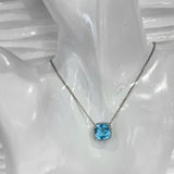 Blue Topaz and White Topaz Halo Pendant, Sterling Silver